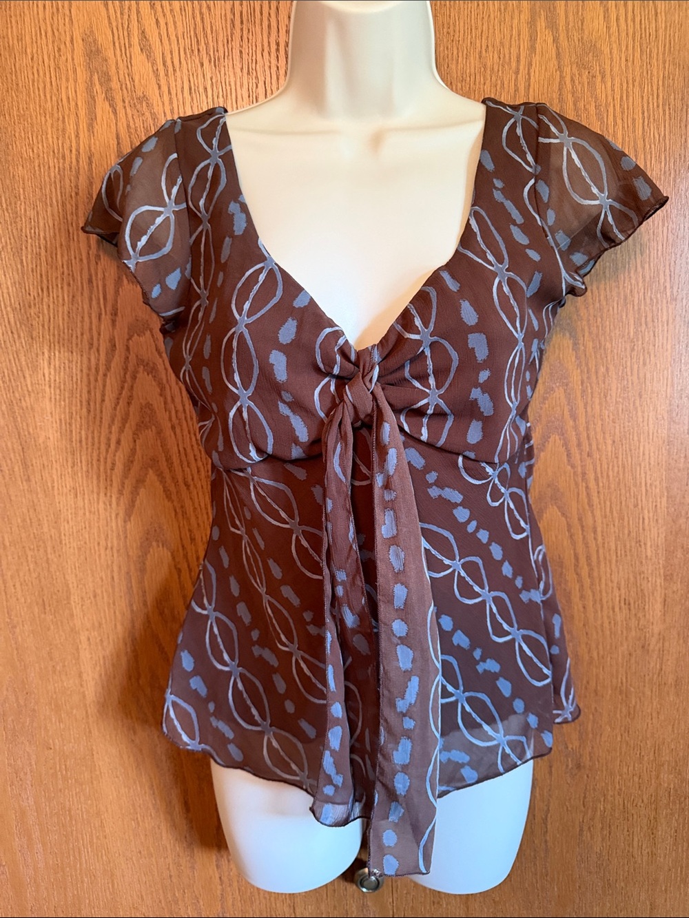 H&M Brown Blouse with Light Blue Chain Print and Front Tie